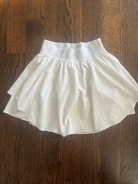 Lululemon White Women's Skirt with seen in shorts.   Size 2.